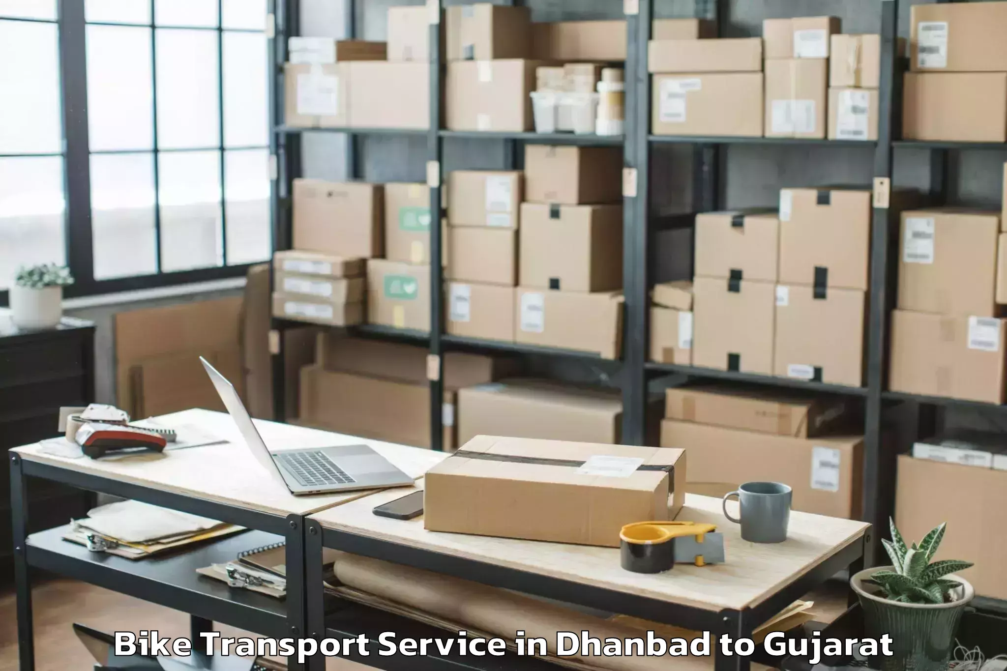 Book Dhanbad to Himmatnagar Bike Transport Online